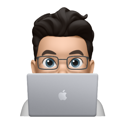 Byron Memoji looking over laptop